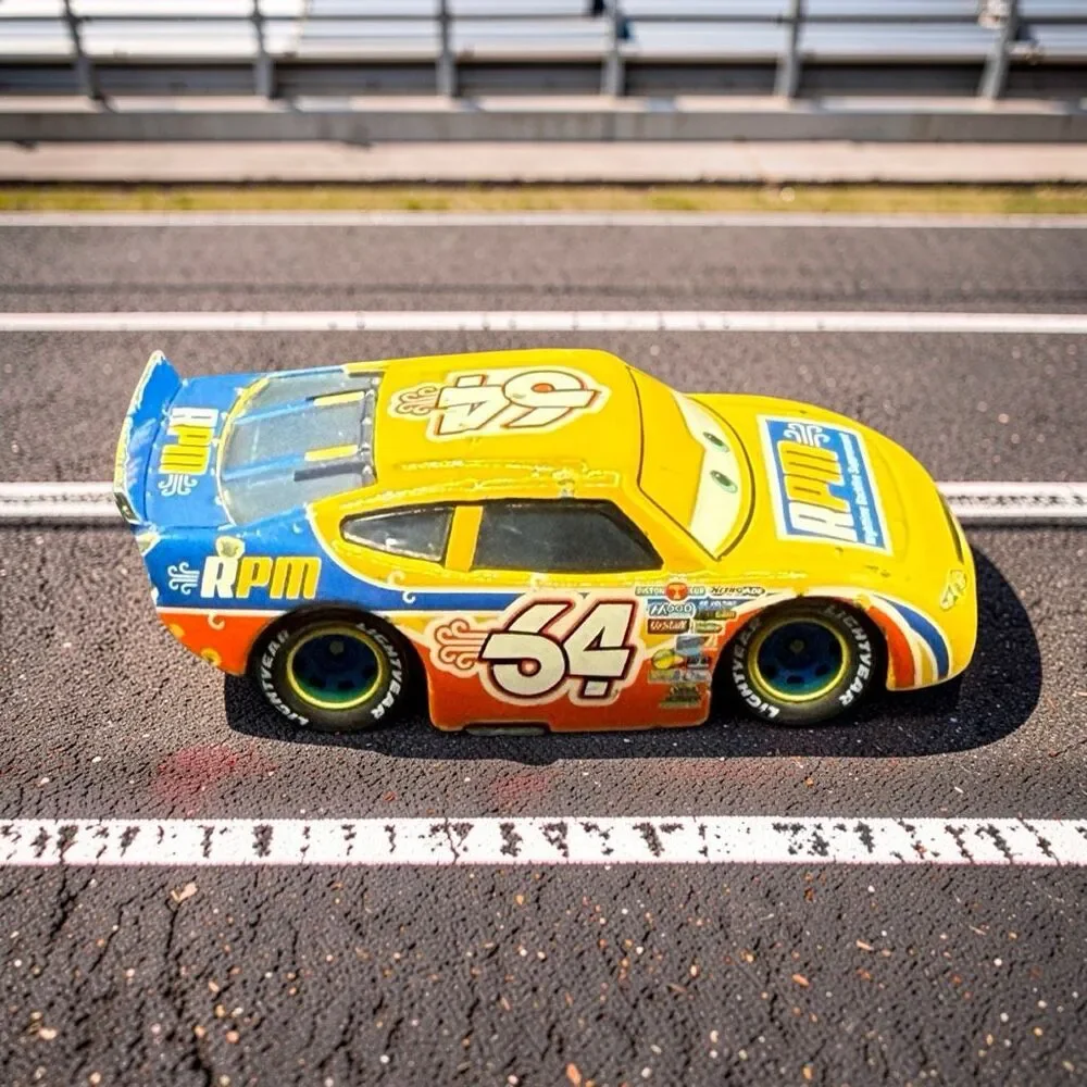 Disney Pixar Cars Winford Bradford Rutherford Yellow Die Cast Race Car A71